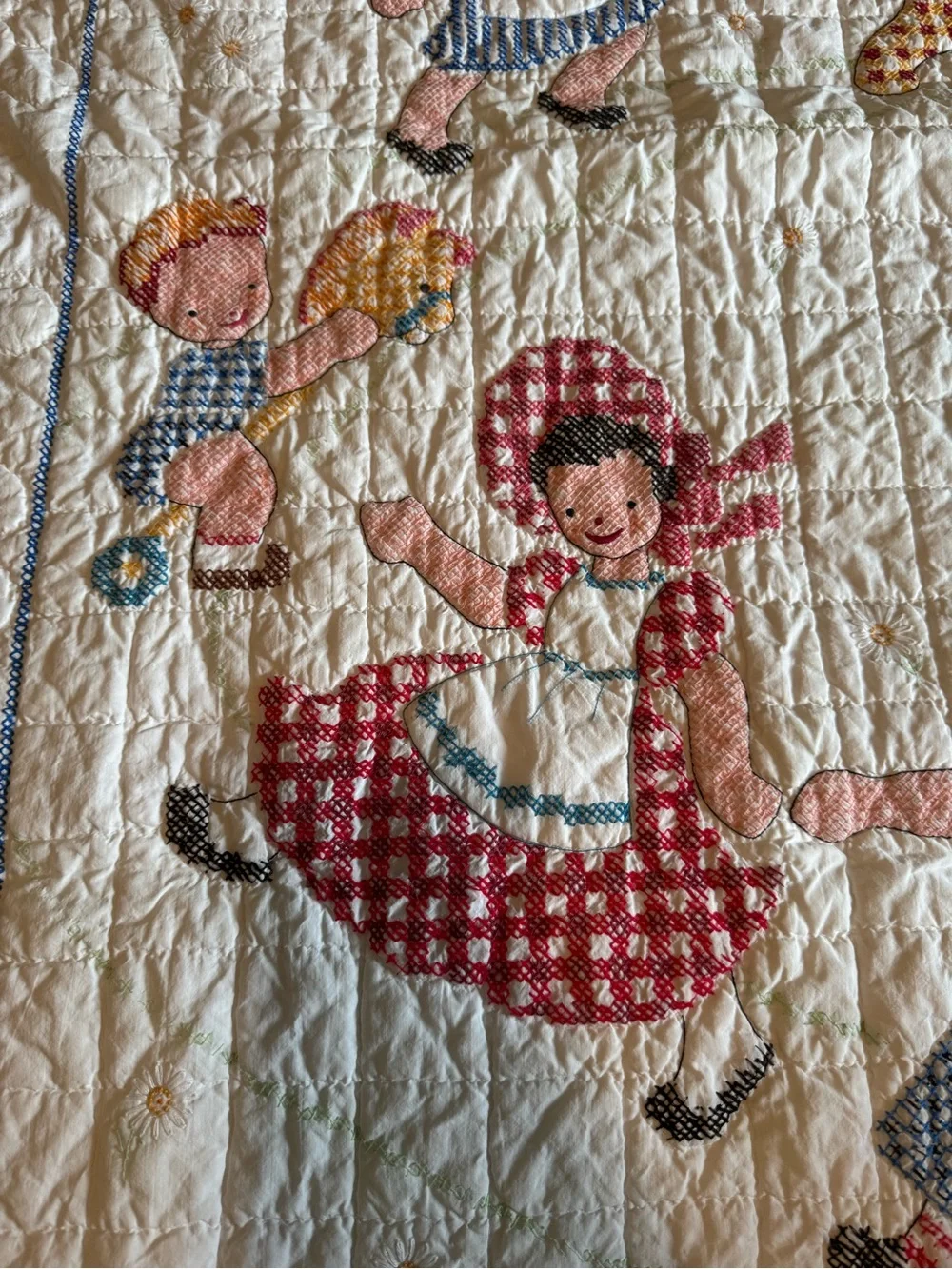 Vintage embroidered kids quilt